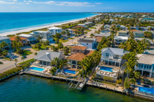 Aerial view of short-term rental homes in Indian Rocks Beach near the Gulf showing coastal properties with pools and outdoor living areas reflecting 2026 market pricing trends